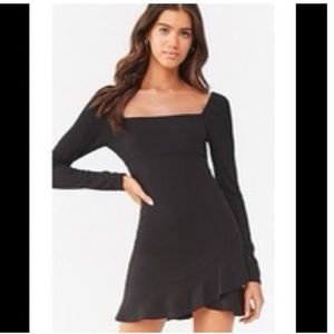 NEW!! Black long sleeve dress with ruffle hem.